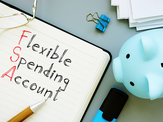 Flexible Spending Account FSA is shown on the conceptual business photo using the text